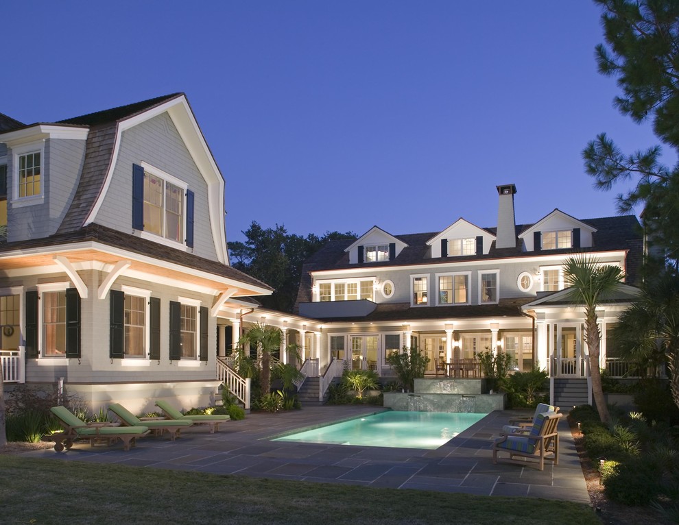 Inspiration for a large timeless three-story wood exterior home remodel in Charleston