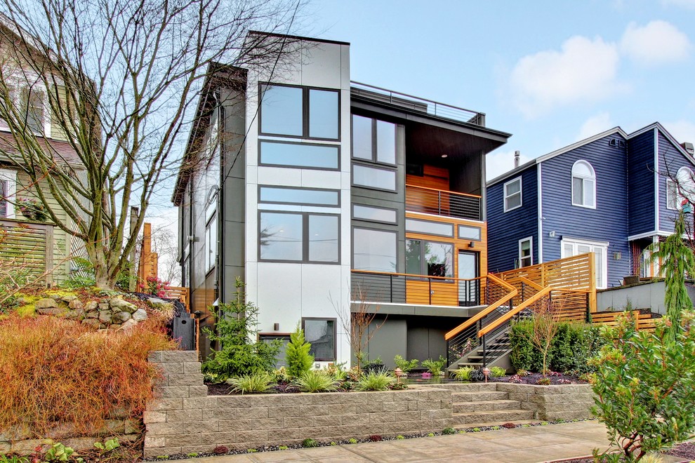Trendy two-story exterior home photo in Seattle