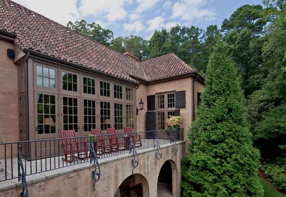 Example of a tuscan exterior home design in New York