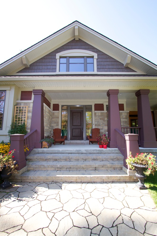 Mid-sized craftsman red two-story mixed siding gable roof idea in Ottawa