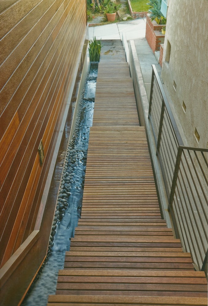 Inspiration for a large coastal white three-story wood flat roof remodel in Los Angeles