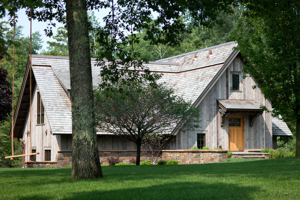 Rustic gray two-story wood gable roof idea in Minneapolis