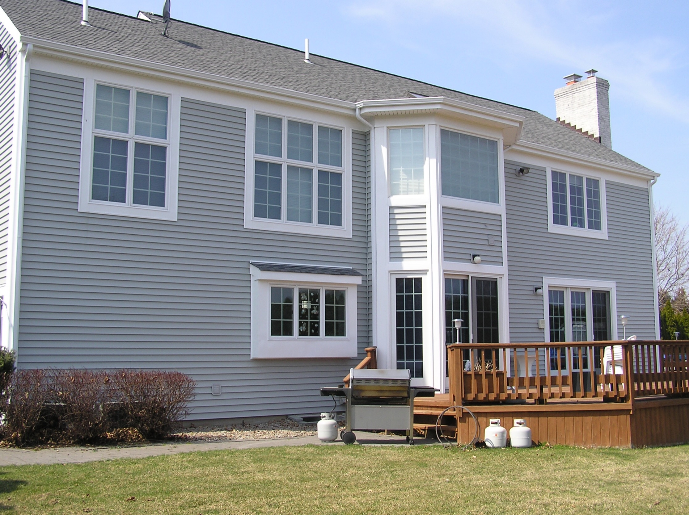 Northport Siding Platinum Gray Clapboard With New Windows And Pewter Gray Roof Traditional Exterior New York By Alpha Windows Siding Houzz