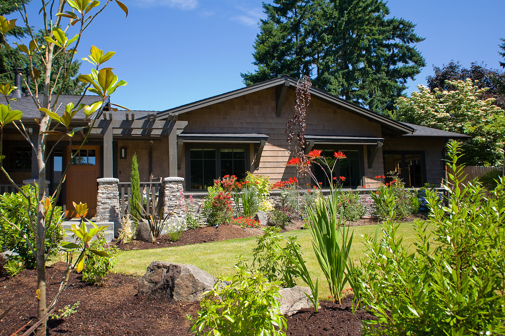Inspiration for a craftsman wood exterior home remodel in Seattle