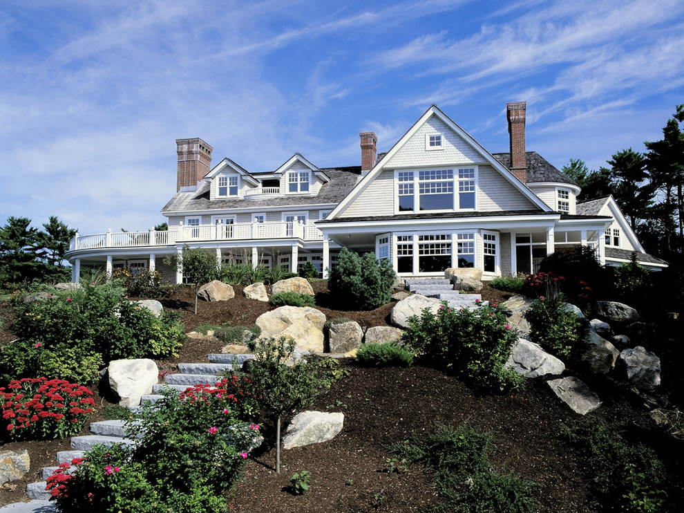 Inspiration for a timeless wood exterior home remodel in Boston