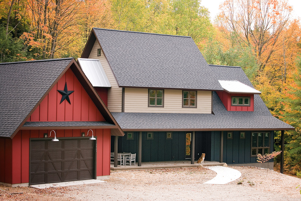 Inspiration for a farmhouse multicolored two-story concrete fiberboard exterior home remodel in Other with a shingle roof