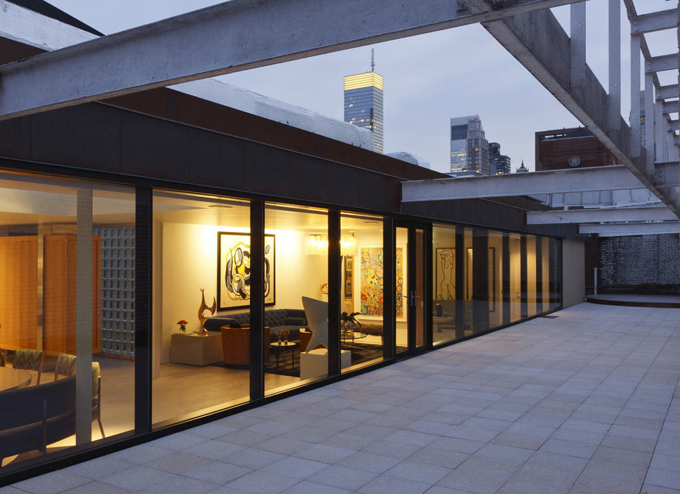 Inspiration for an industrial glass house exterior in New York.