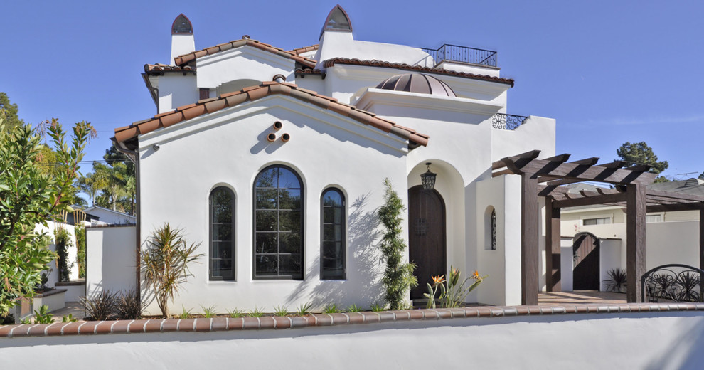 Oceanside Spanish Mediterranean 3 Story home Mediterranean Exterior