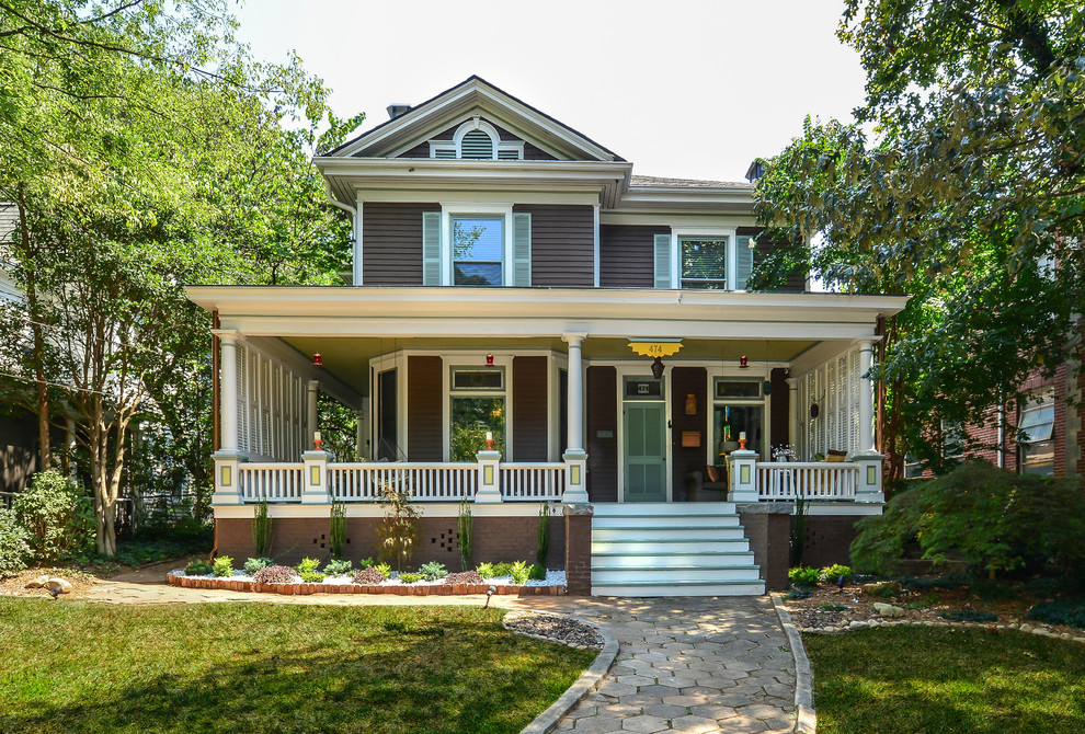 Inspiration for a mid-sized timeless brown two-story wood gable roof remodel in Atlanta