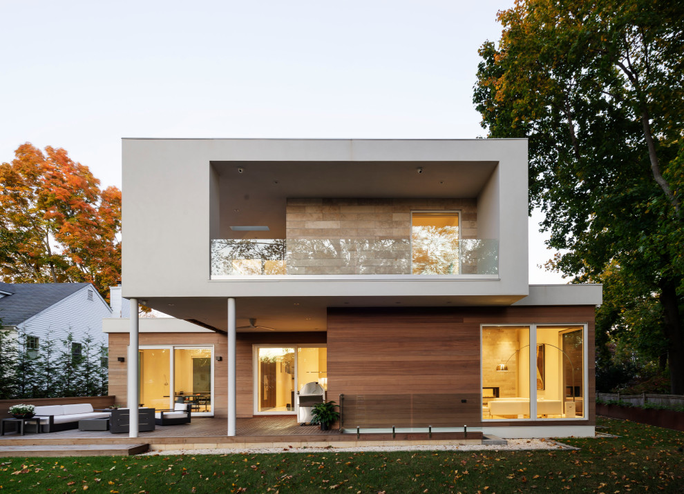 Mid-sized minimalist multicolored two-story mixed siding exterior home photo in New York