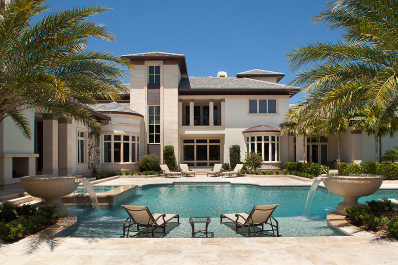 Inspiration for a huge transitional white two-story exterior home remodel in Miami