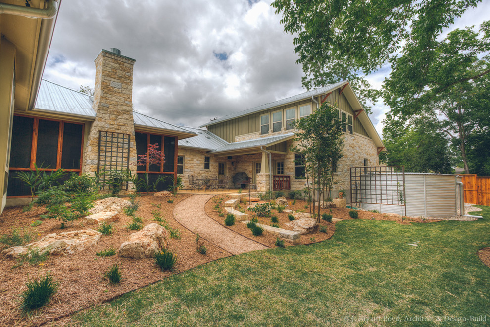 Example of an arts and crafts exterior home design in Austin