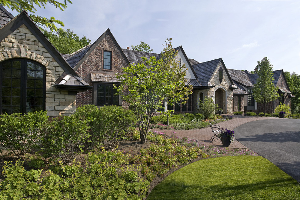 Old World Brick Stone And Stucco Transitional Ranch In Bannockburn Traditional Exterior Chicago By Orren Pickell Building Group Houzz