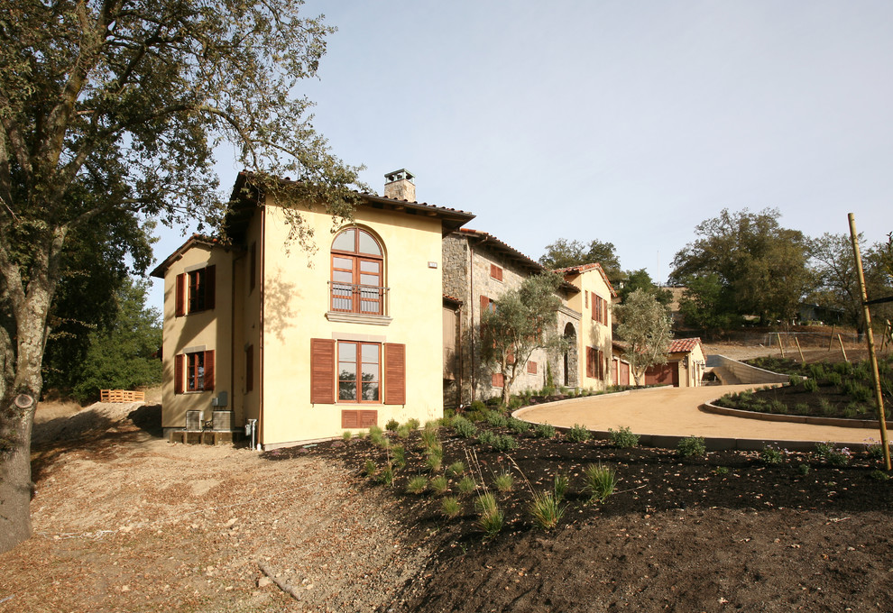 Tuscan exterior home photo in Other