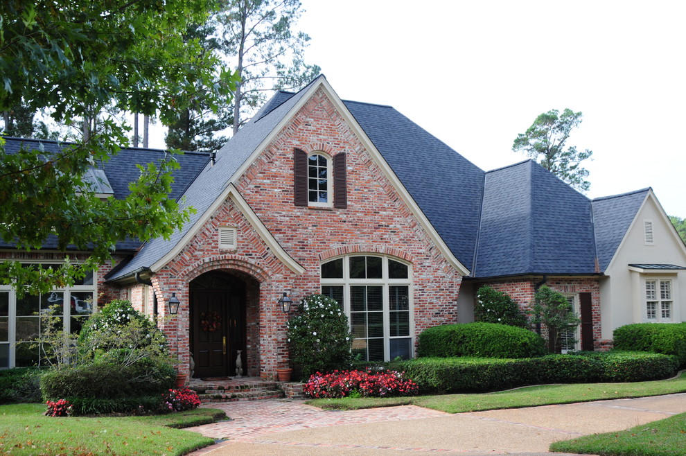 This is an example of a traditional two floor brick house exterior in New Orleans.