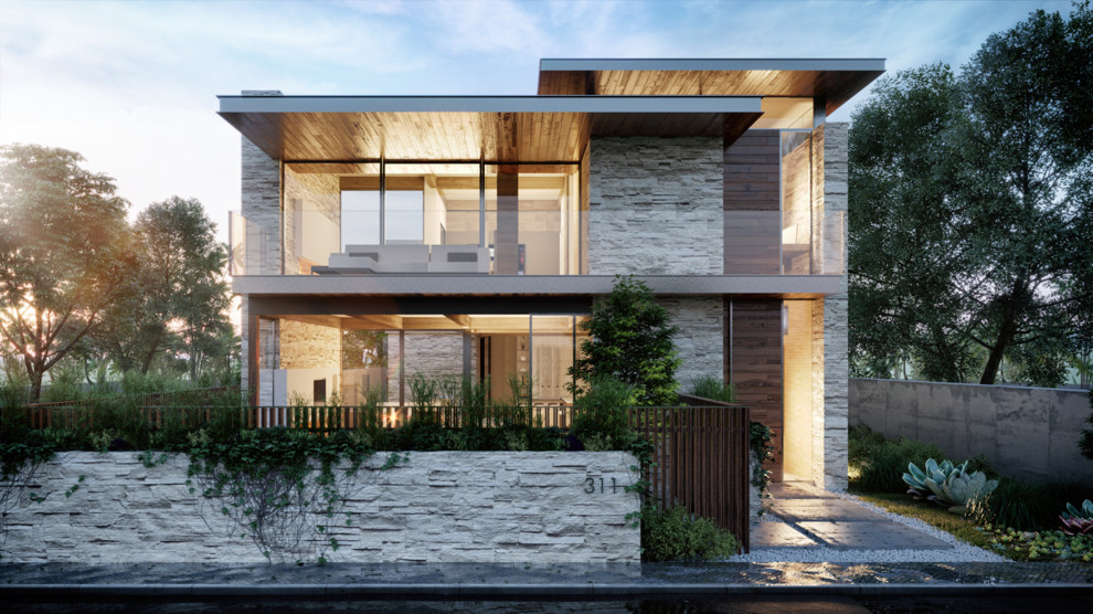 Großes, Zweistöckiges Modernes Einfamilienhaus mit Steinfassade, weißer Fassadenfarbe und Flachdach in Orange County