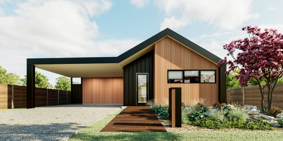 This is an example of a medium sized modern bungalow detached house in Melbourne with wood cladding, a pitched roof, a metal roof, a grey roof and board and batten cladding.