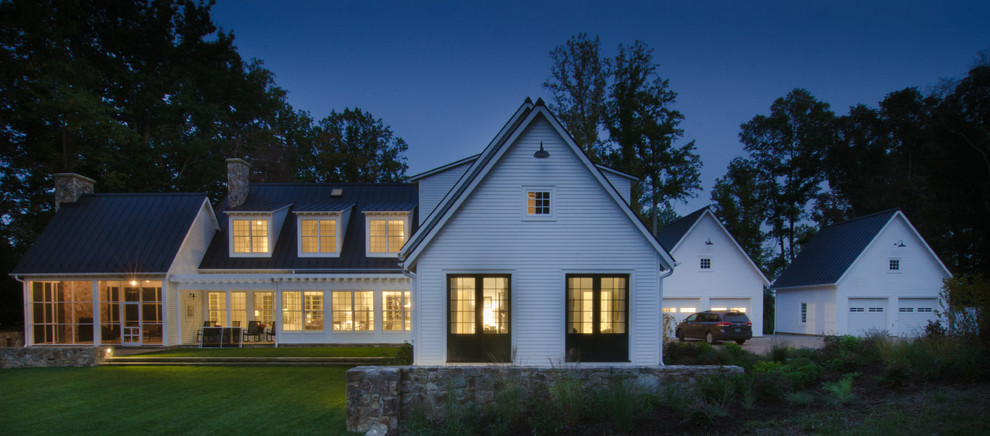 Inspiration for a large timeless white two-story wood exterior home remodel in DC Metro