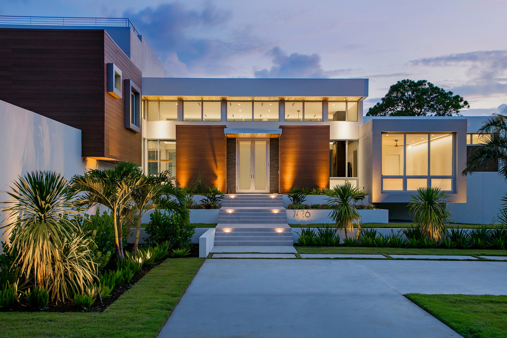 Large modern white two-story mixed siding exterior home idea in Tampa