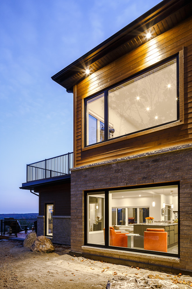 Design ideas for a contemporary house exterior in Ottawa.