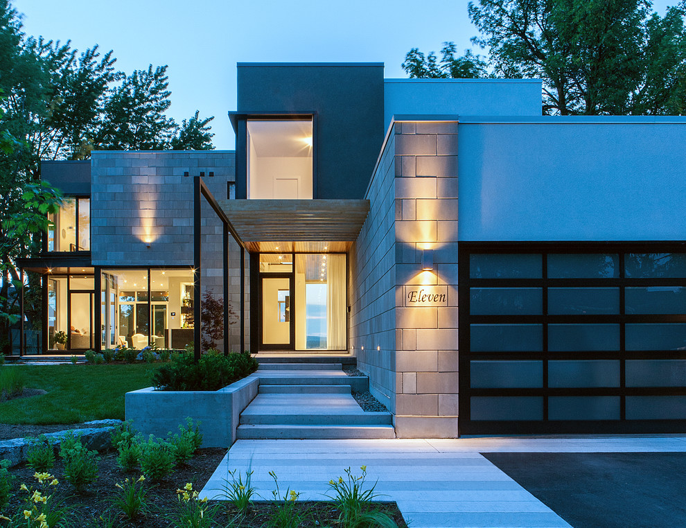 Contemporary two-story exterior home idea in Ottawa