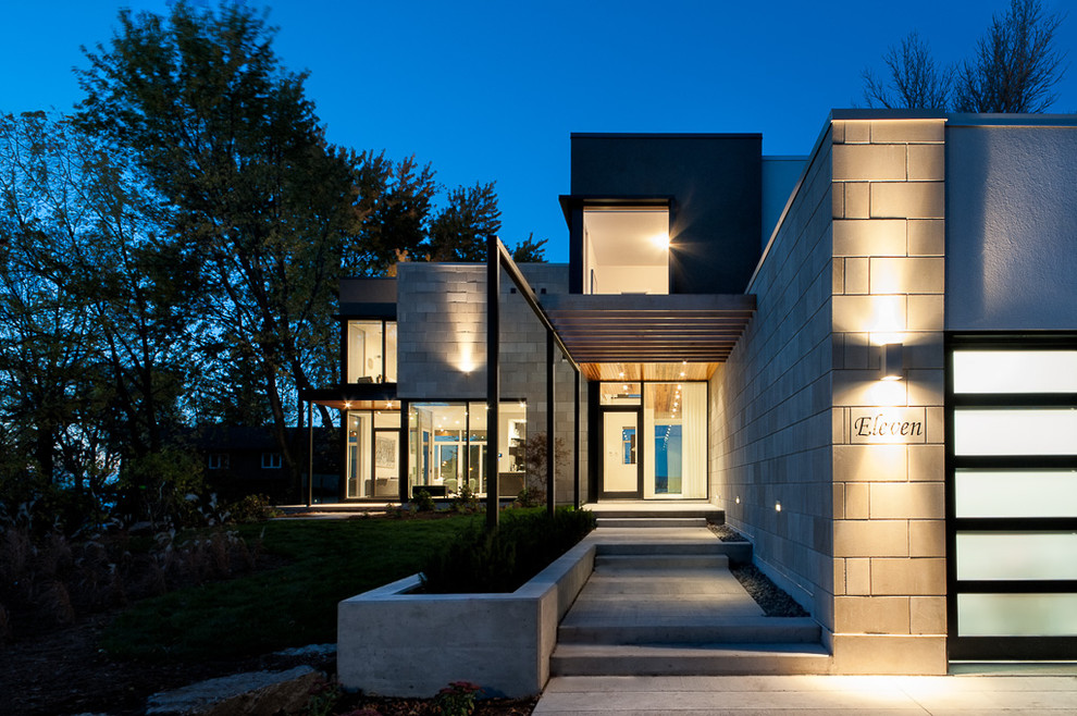 Photo of a contemporary two floor house exterior in Ottawa with mixed cladding.