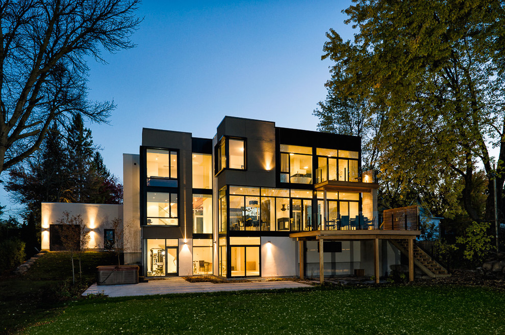 Contemporary house exterior in Ottawa with three floors.