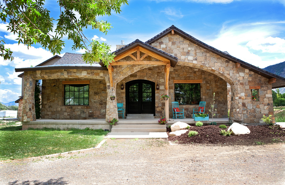 Rustic bungalow house exterior in Salt Lake City with stone cladding.