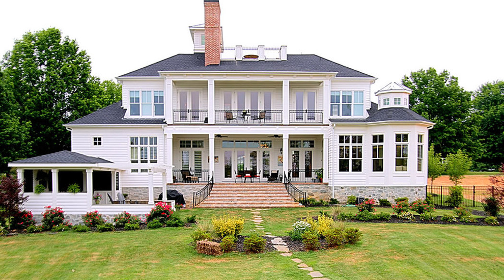 Elegant white exterior home photo in Charlotte