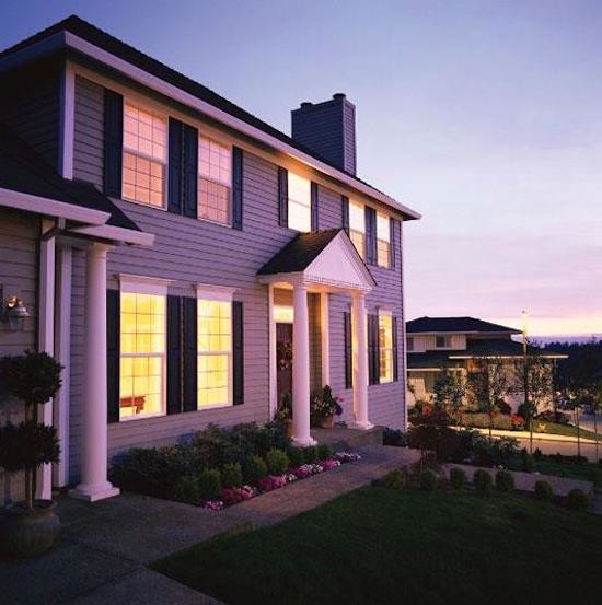 Inspiration for a mid-sized timeless blue two-story vinyl exterior home remodel in Austin