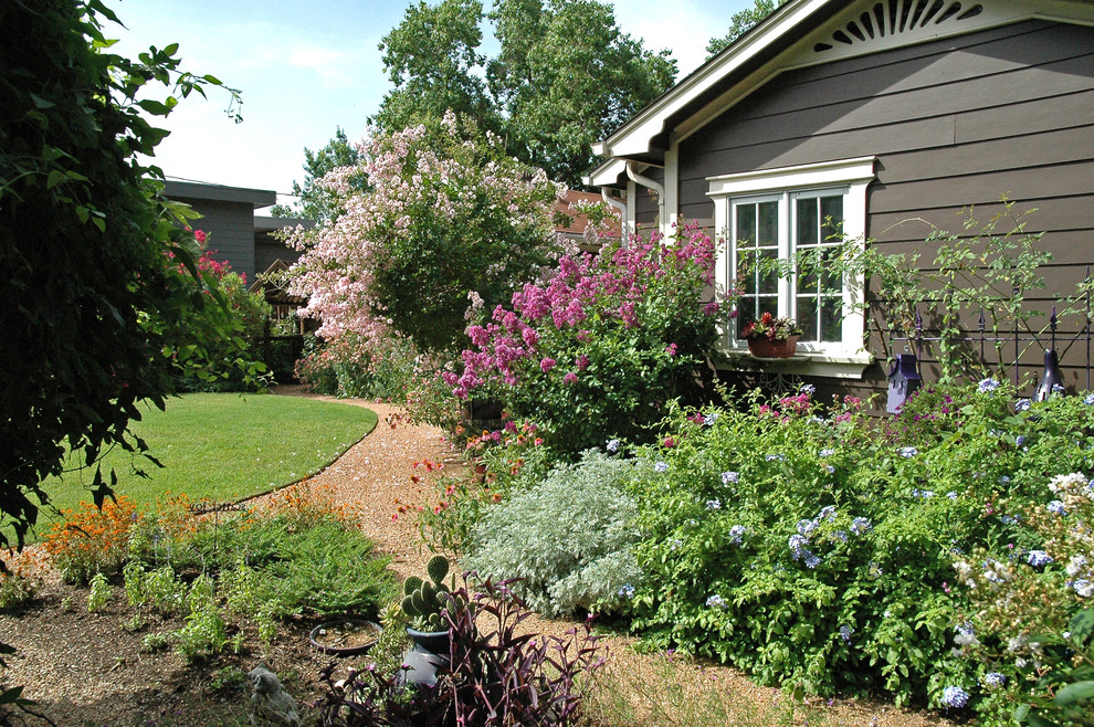 This is an example of a medium sized classic garden in Austin.