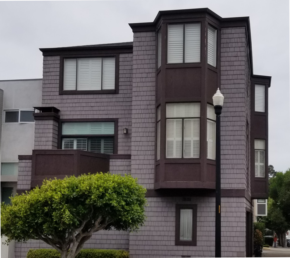 Idées déco pour une façade de maison de ville violet de taille moyenne et à deux étages et plus.