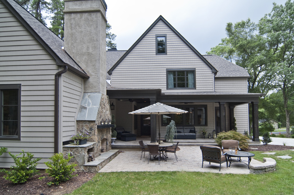 Mid-sized traditional beige split-level mixed siding exterior home idea in Charlotte