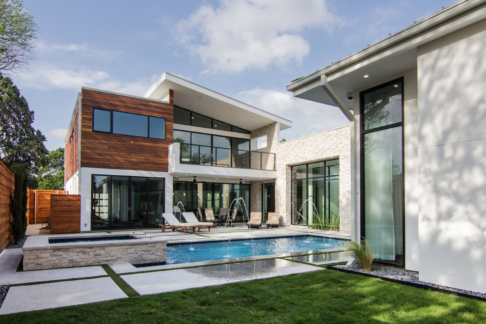 Design ideas for a contemporary house exterior in Dallas.