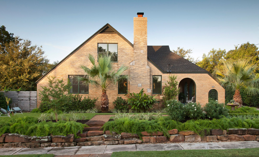 Example of an eclectic exterior home design in Austin