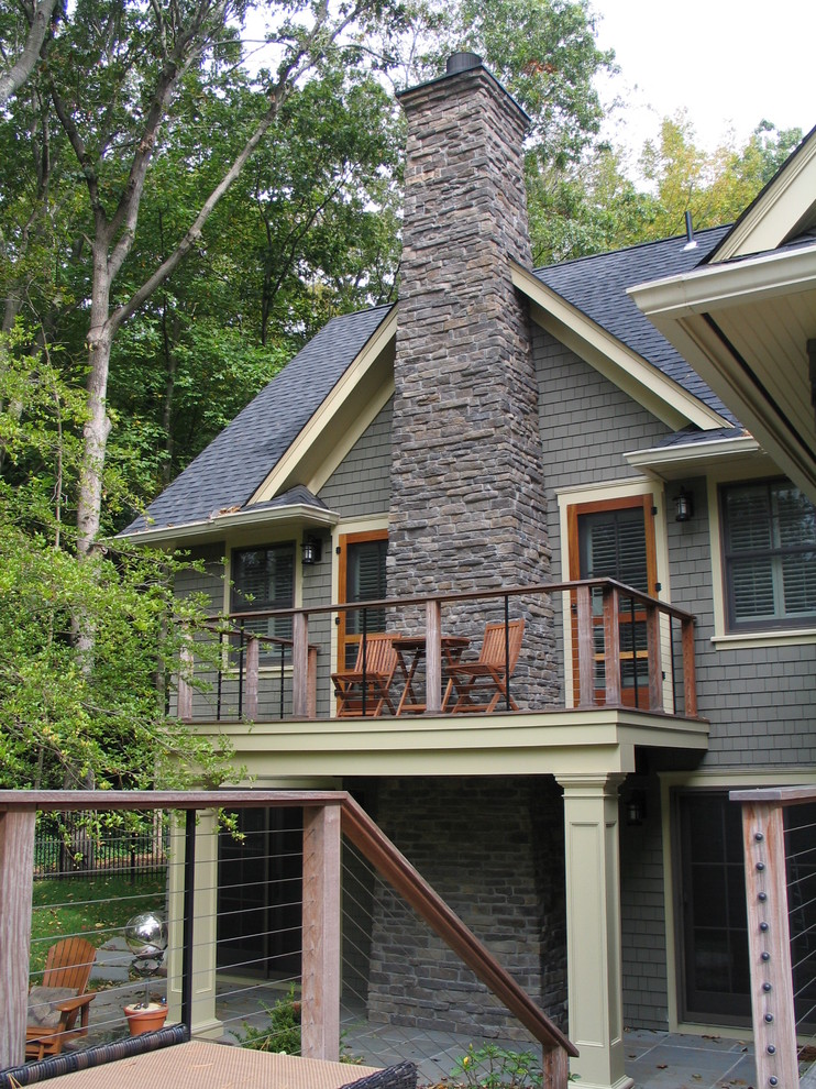 Inspiration for a craftsman gray two-story wood gable roof remodel in New York