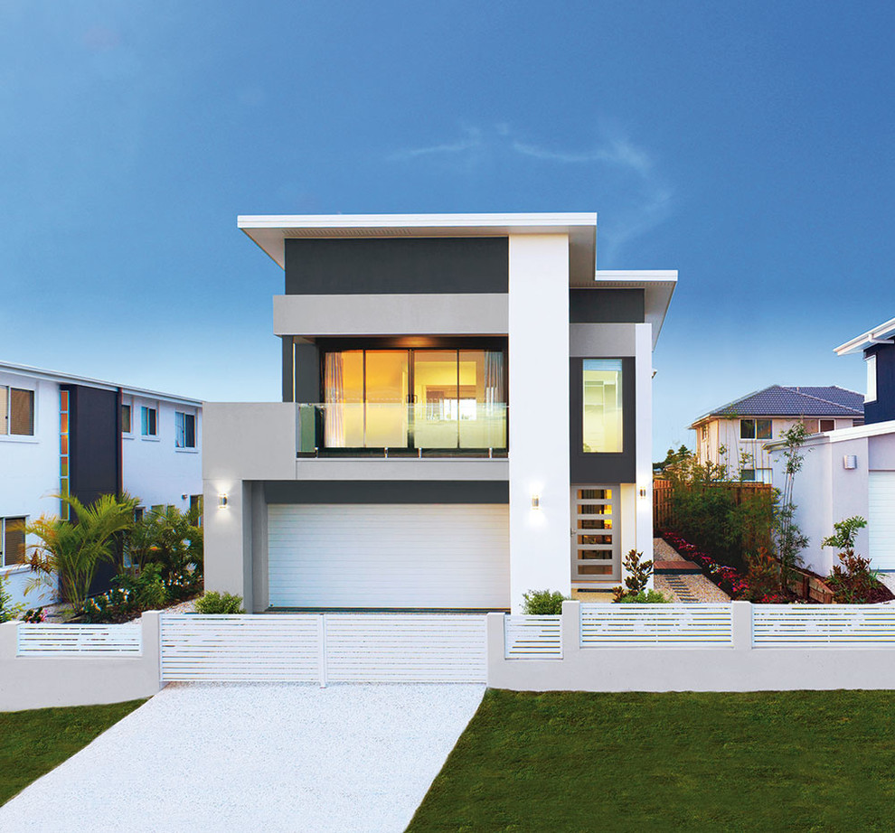 Свежая идея для дизайна: двухэтажный дом среднего размера в современном стиле с плоской крышей - отличное фото интерьера