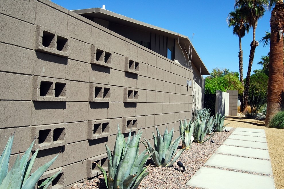 Idee per la facciata di una casa beige moderna a un piano di medie dimensioni con rivestimento in stucco