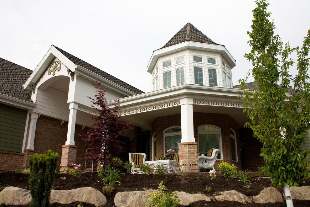 Large traditional green three-story mixed siding gable roof idea in Salt Lake City