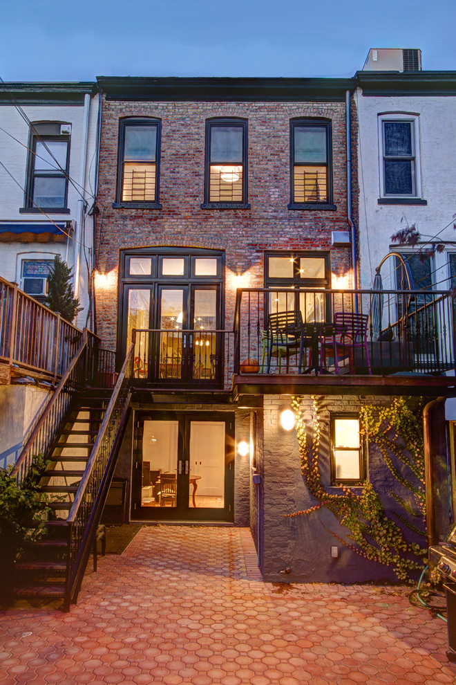 Elegant brick exterior home photo in New York