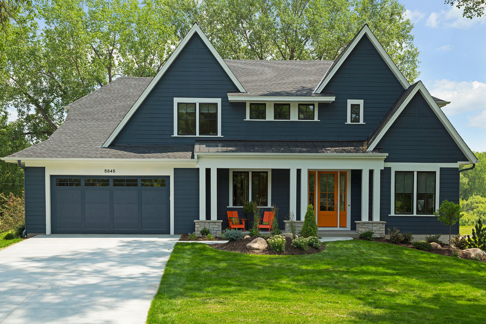 Transitional blue two-story wood exterior home idea in Minneapolis