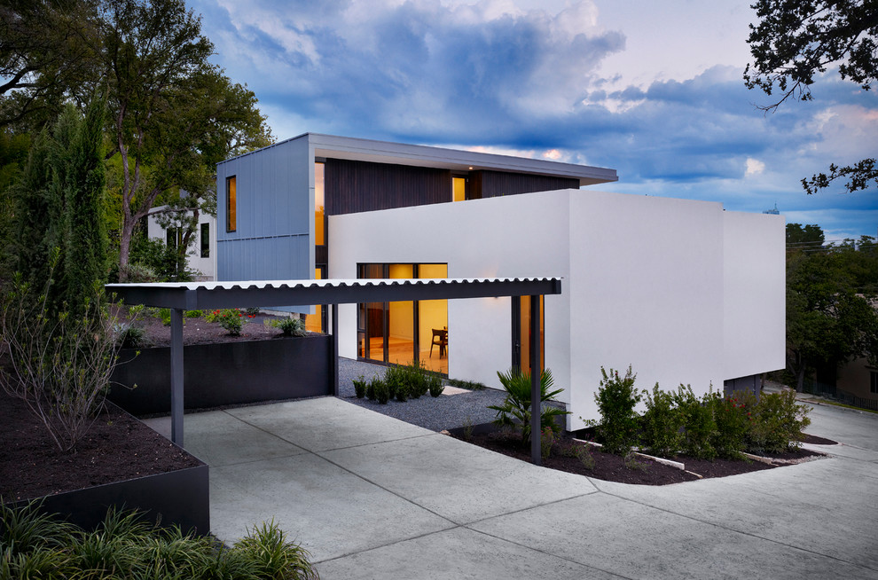 Cette image montre une façade de maison métallique minimaliste.