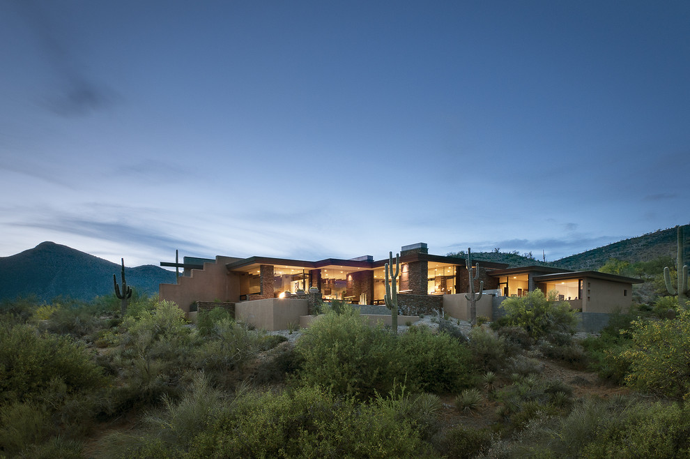Inspiration for a southwestern stucco exterior home remodel in Phoenix