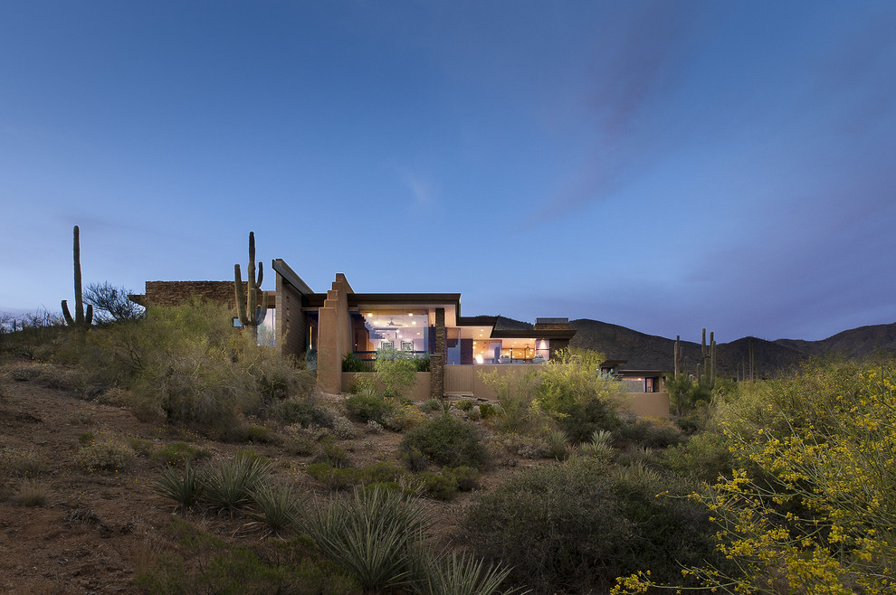 Southwestern exterior home idea in Phoenix