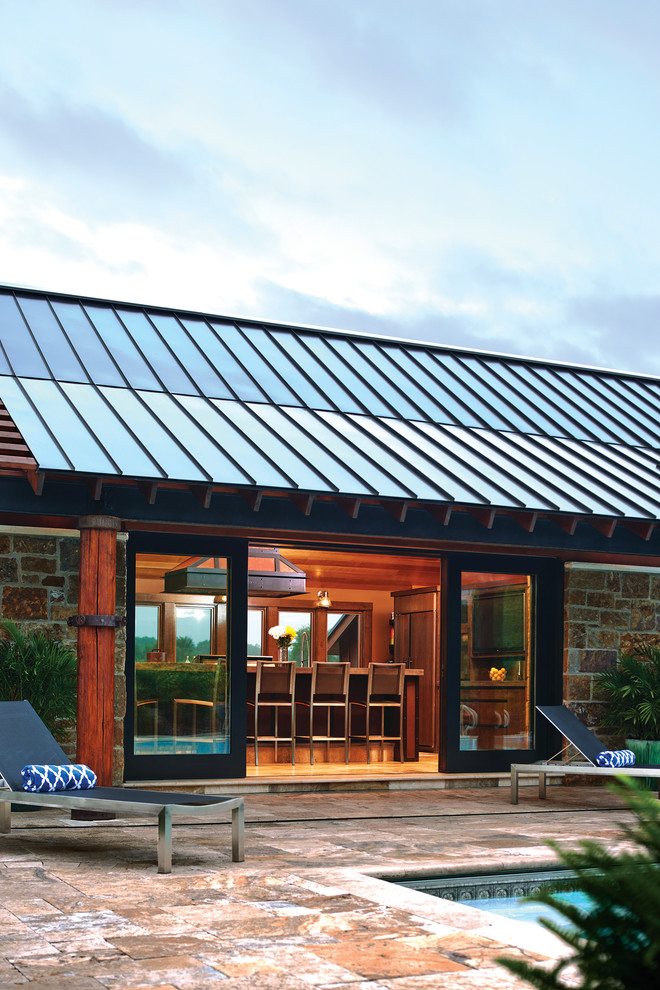 Inspiration for a large contemporary back patio in Charlotte with no cover.