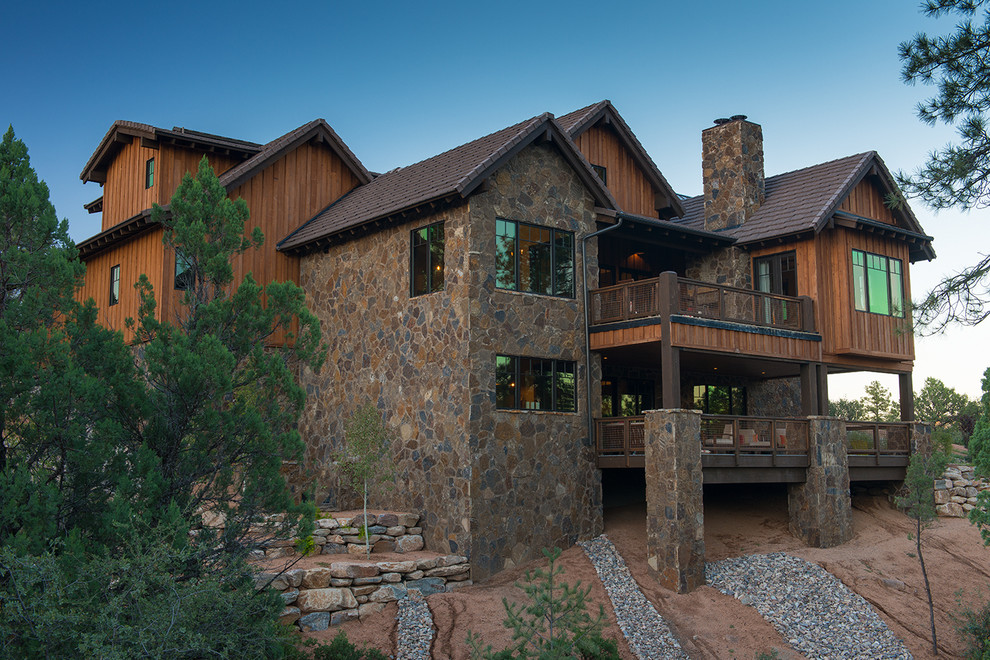 Huge mountain style brown two-story mixed siding gable roof photo in Phoenix