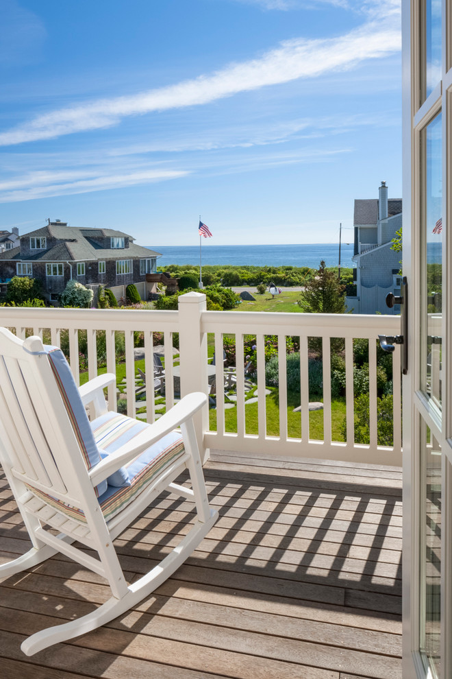 Large coastal beige two-story wood house exterior idea in Boston with a gambrel roof and a shingle roof