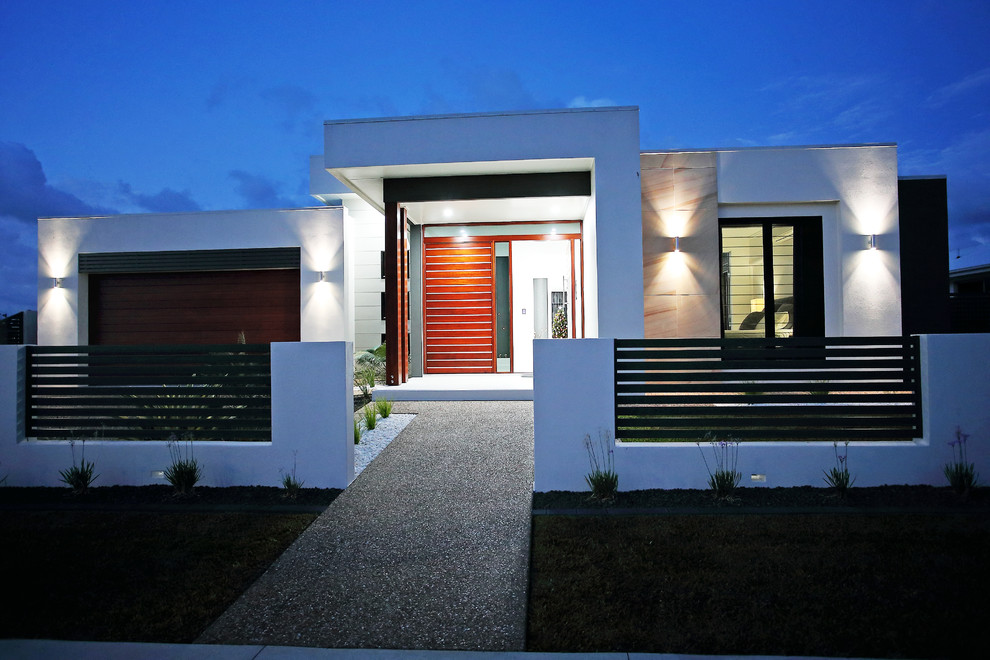 Inspiration pour une façade de maison blanche minimaliste en béton de taille moyenne et de plain-pied avec un toit plat et un toit en métal.