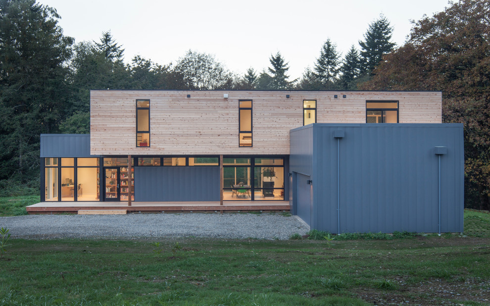 Idee per la facciata di una casa piccola moderna a due piani con tetto piano
