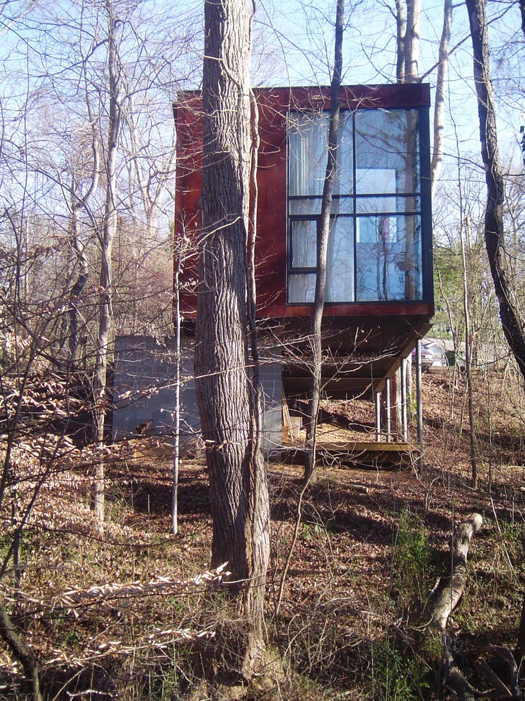 Idee per la facciata di una casa piccola rossa moderna a un piano